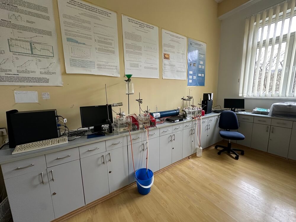 Well-organized laboratory in UES with scientific equipment, computers on a long countertop