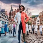 an image of a doctor with more doctors behind him and buildings that represent US and Europe in the background