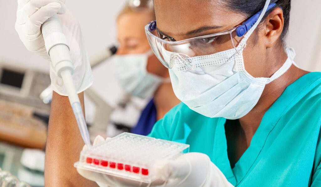 Student in the lab performing a test